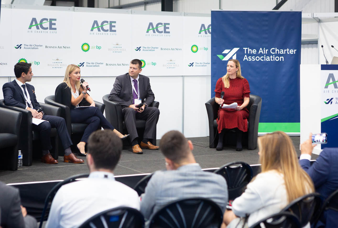 Industry panel discussion hosted by The Air Charter Association at a professional aviation event.