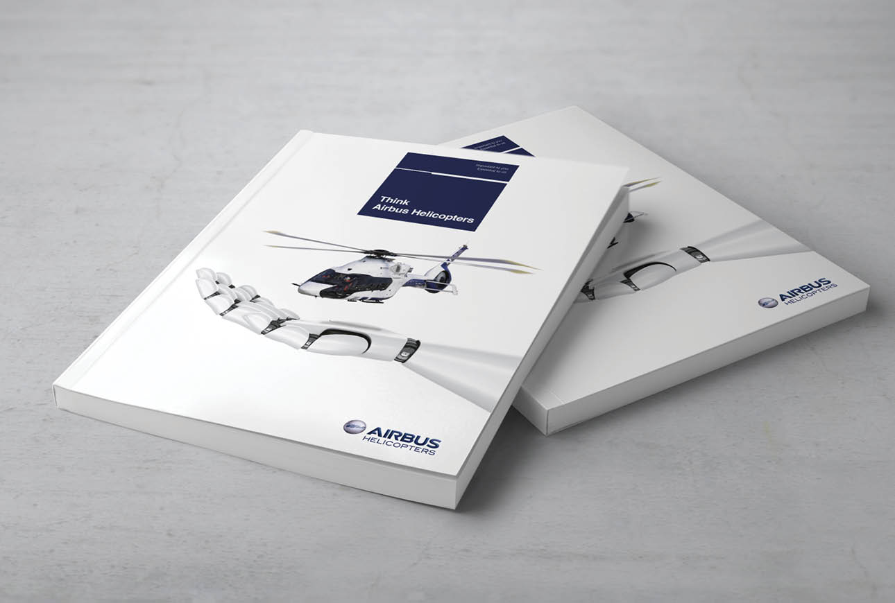 Airbus Helicopters corporate brochure cover design with helicopter and robotic hand, aviation branding mockup