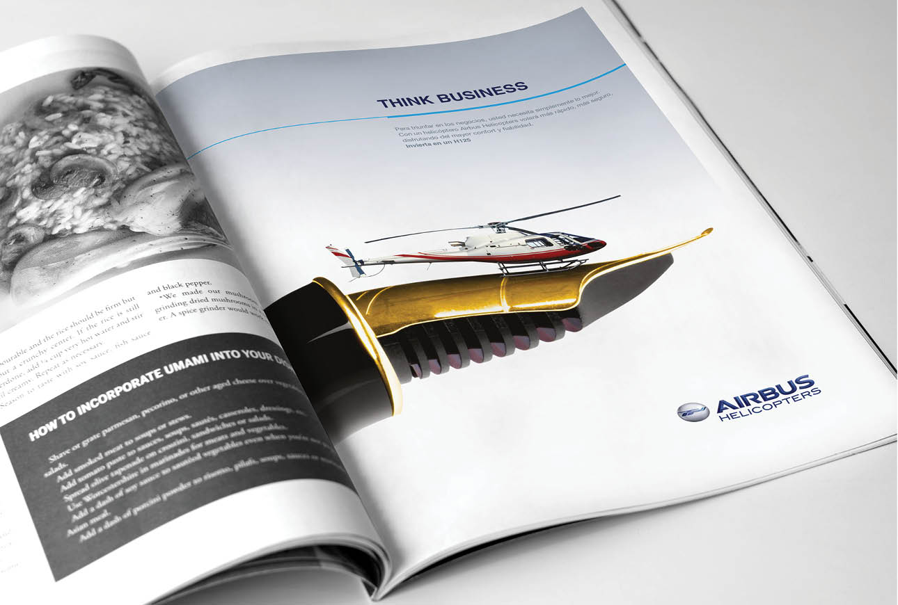 Airbus Helicopters magazine advert showing helicopter on spoon illustrating business aviation marketing concept