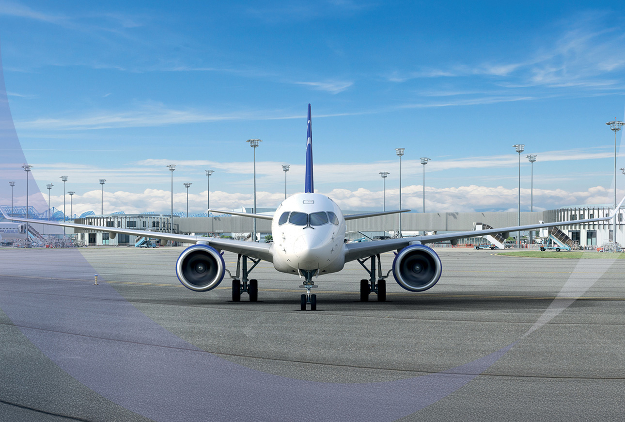 Front‑on view of a commercial aircraft on a runway used in an aviation corporate report and brochure design.