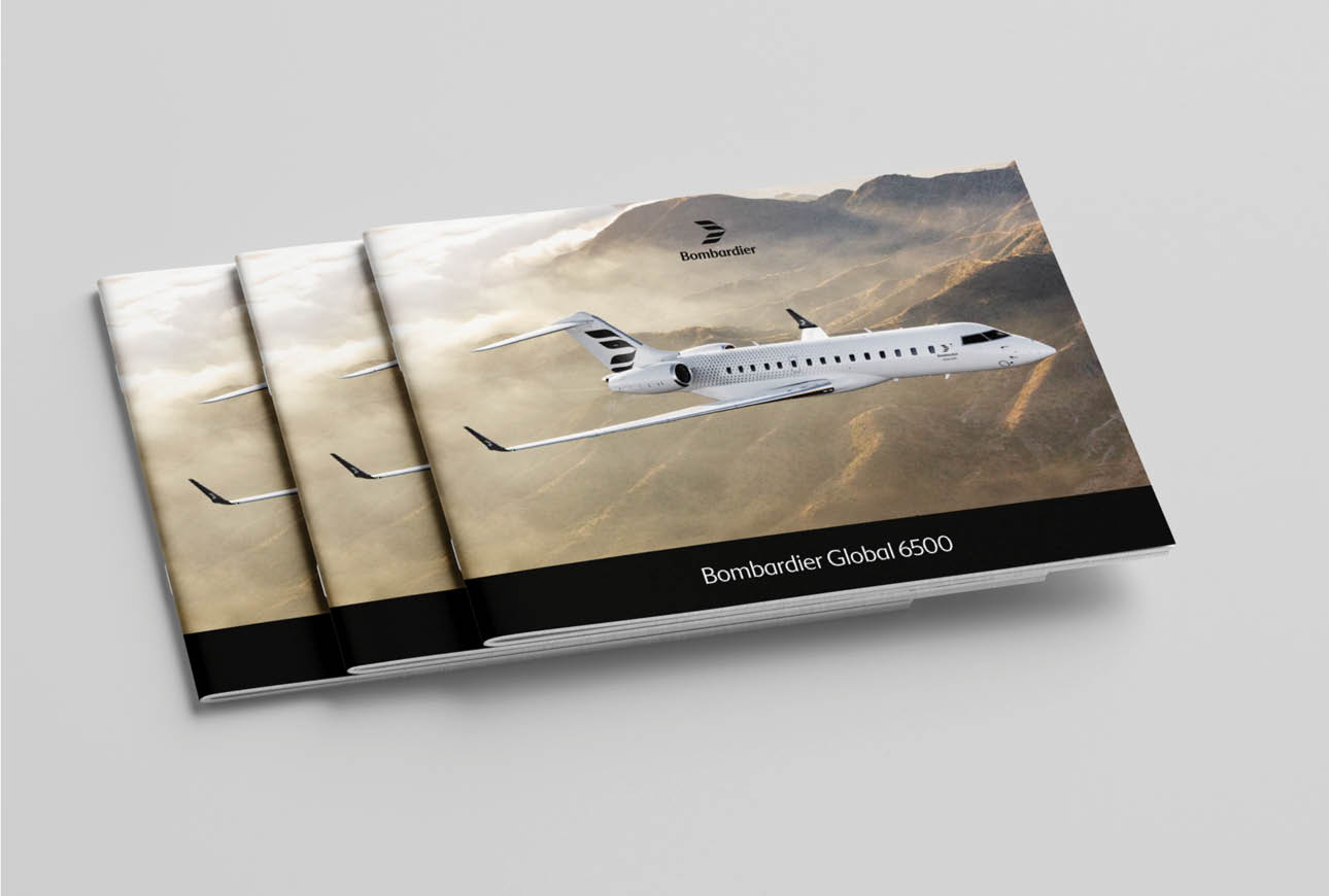 Printed brochures featuring Bombardier Global 6500 aircraft in flight.