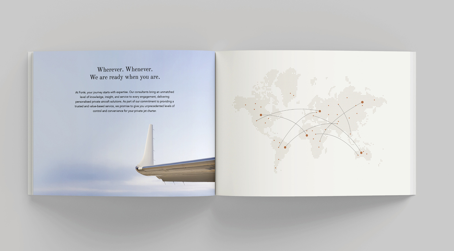 Luxury aviation brochure with private jet wing and global flight route map