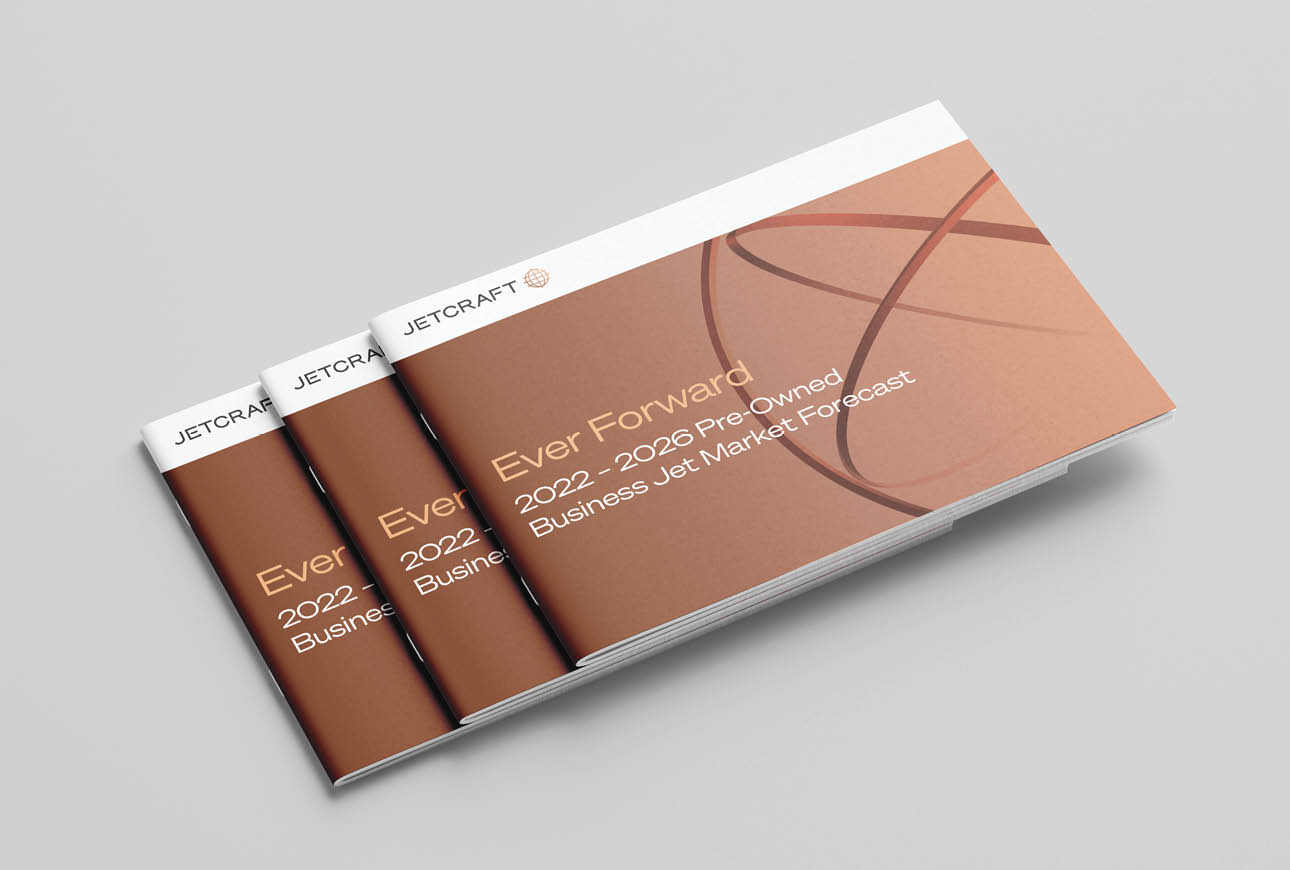 Stacked Jetcraft Ever Forward business jet market forecast brochures with branded cover design