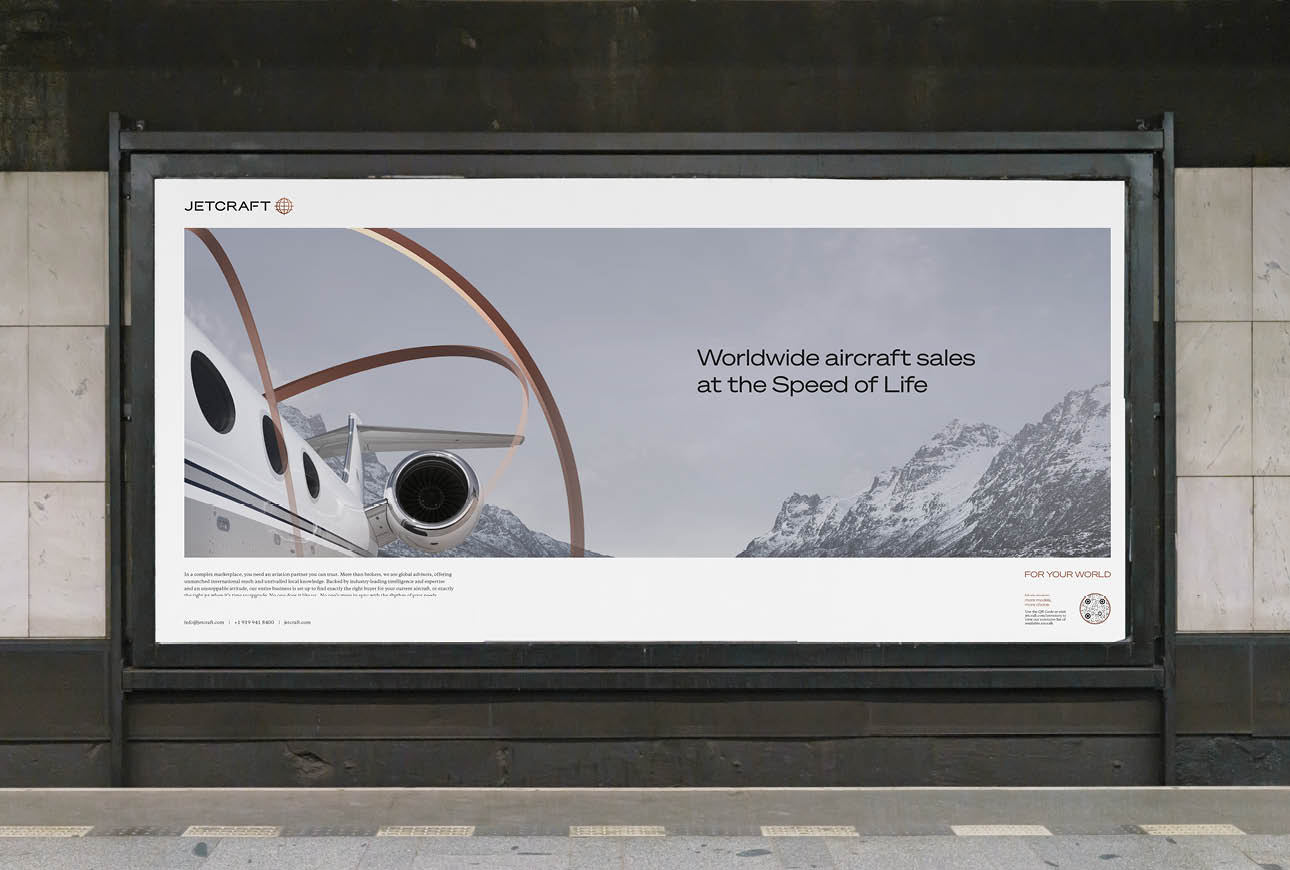 Jetcraft outdoor billboard featuring private jet imagery and global aircraft sales messaging in an urban setting