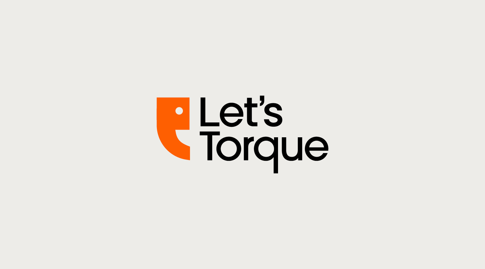 Let’s Torque logo featuring a distinctive orange icon and black typography on a neutral background